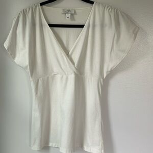 Ann Taylor LOFT size S cream colored V neck cross top